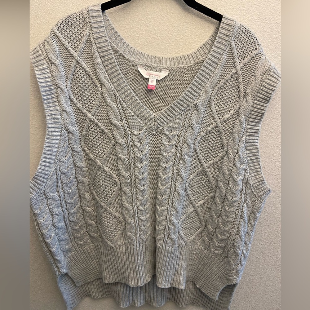 Grey knitted sweater vest